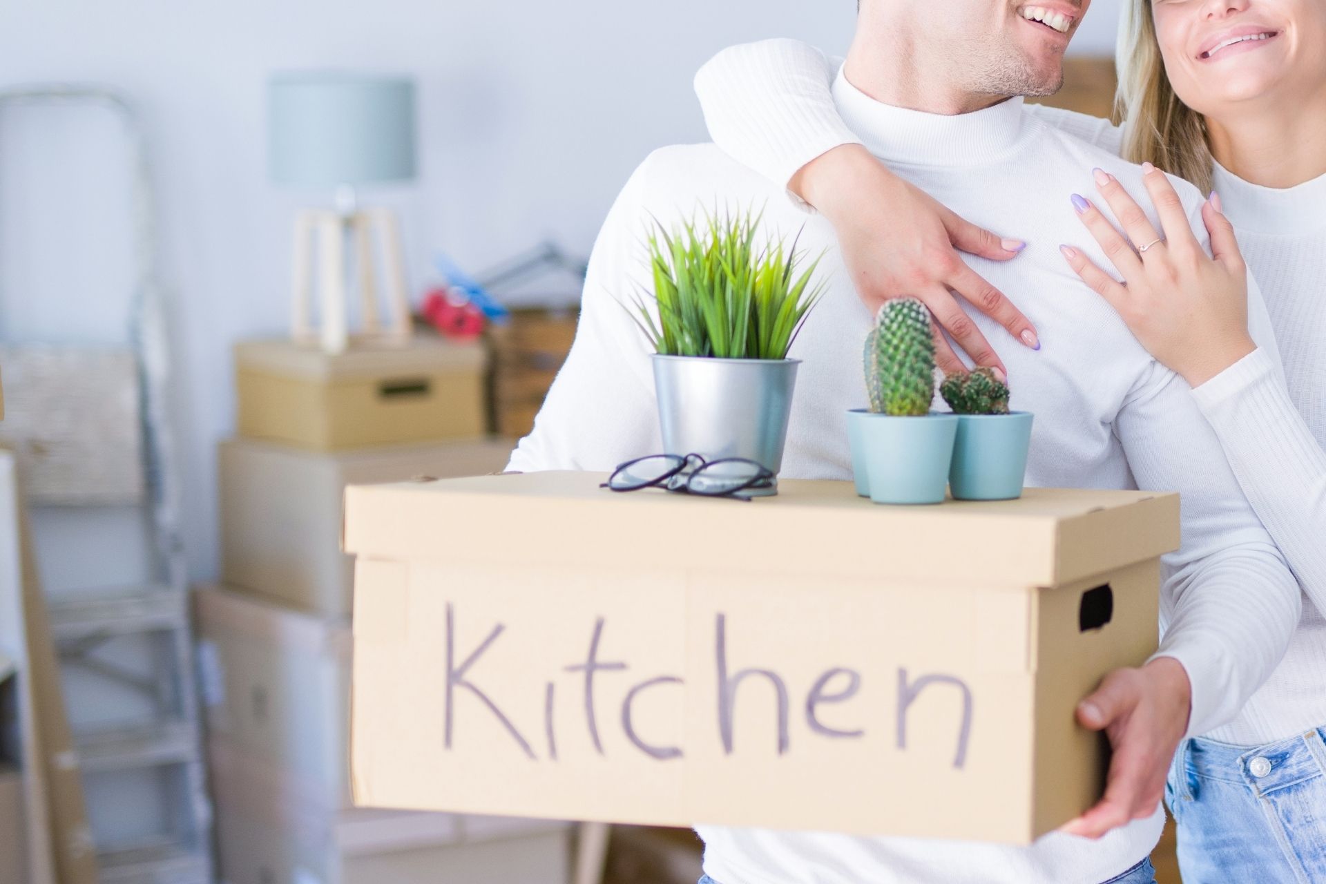 Man inspecting underneath house